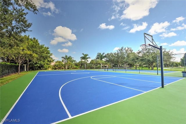 view of sport court featuring community basketball court and fence