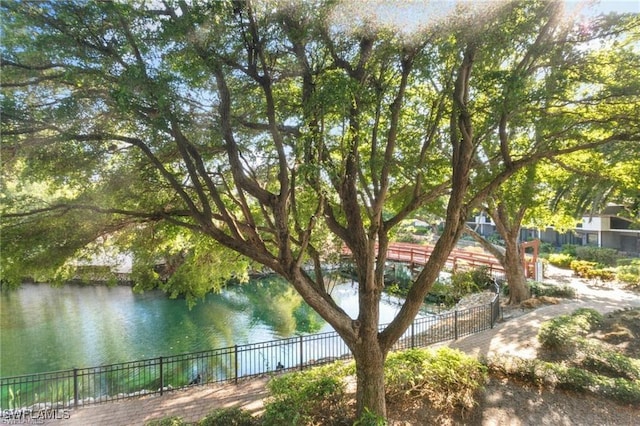 view of water feature featuring fence