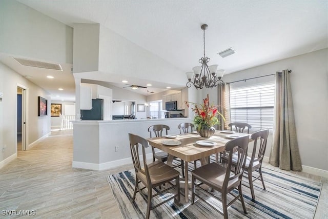 dining area featuring baseboards, visible vents, light wood-style flooring, and recessed lighting