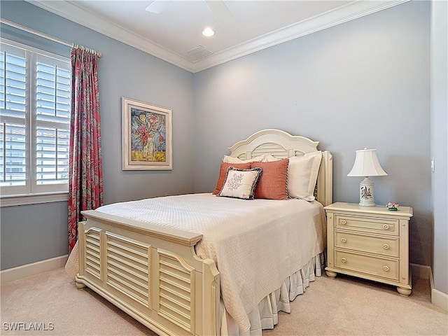 bedroom featuring light carpet, ornamental molding, and baseboards