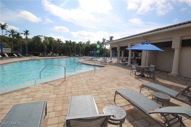 pool featuring a patio