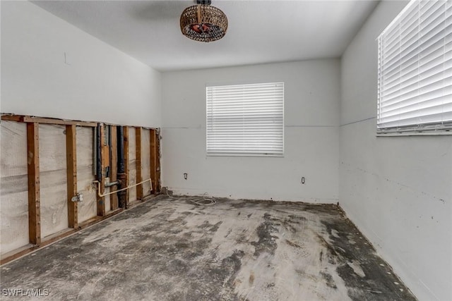 empty room featuring a wealth of natural light