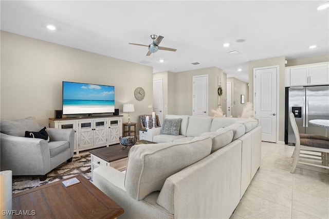 living room with recessed lighting and ceiling fan