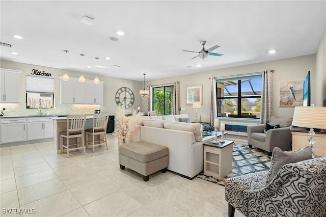 living room featuring visible vents, recessed lighting, and ceiling fan