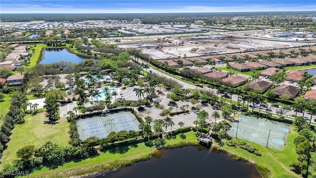 aerial view with a residential view and a water view