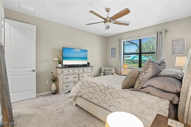 bedroom with baseboards, carpet floors, and ceiling fan