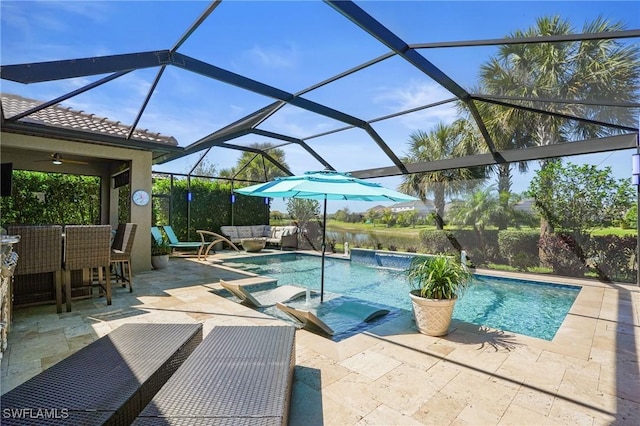 view of swimming pool featuring an outdoor hangout area, a pool with connected hot tub, a lanai, and a patio area