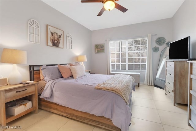 bedroom with light tile patterned floors and a ceiling fan