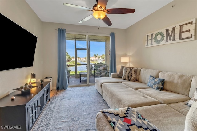 living area with ceiling fan
