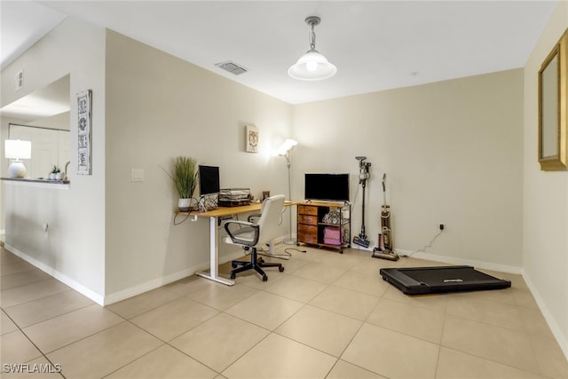 office with visible vents, baseboards, and tile patterned floors