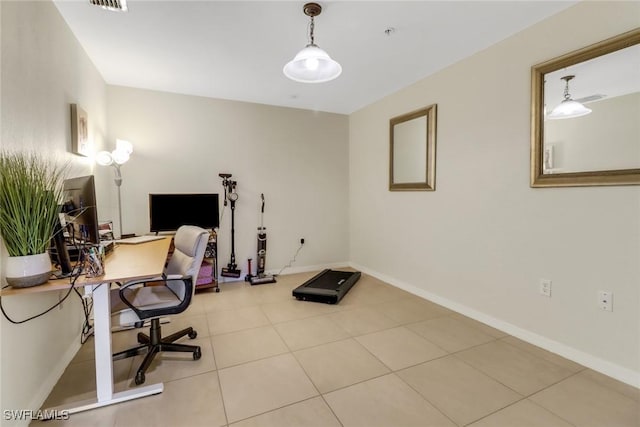 home office featuring visible vents, baseboards, and tile patterned floors
