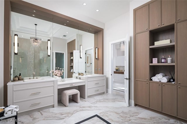 bathroom with built in features, marble finish floor, recessed lighting, a shower stall, and vanity