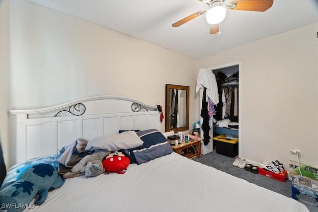 bedroom with a ceiling fan, a closet, and dark carpet