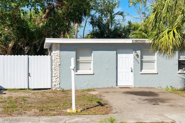 view of outdoor structure with fence