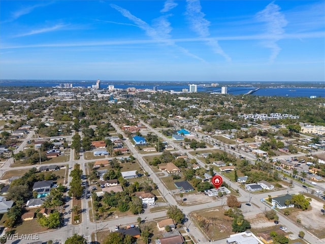 aerial view with a view of city and a water view