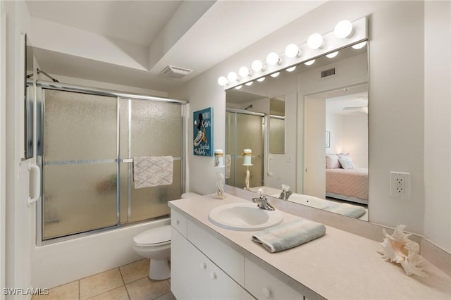 ensuite bathroom featuring ensuite bathroom, shower / bath combination with glass door, visible vents, and tile patterned floors