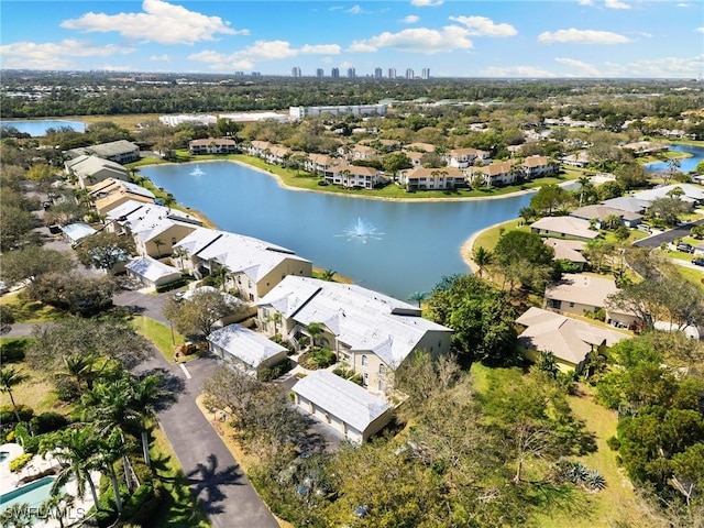 birds eye view of property with a residential view and a water view