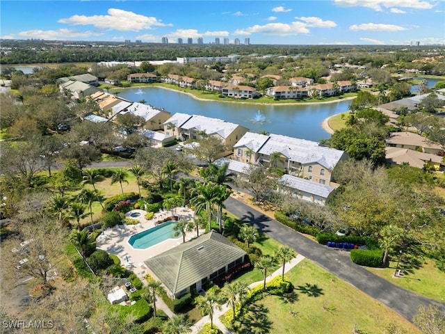 aerial view with a residential view and a water view