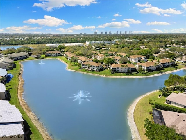 aerial view featuring a water view and a residential view