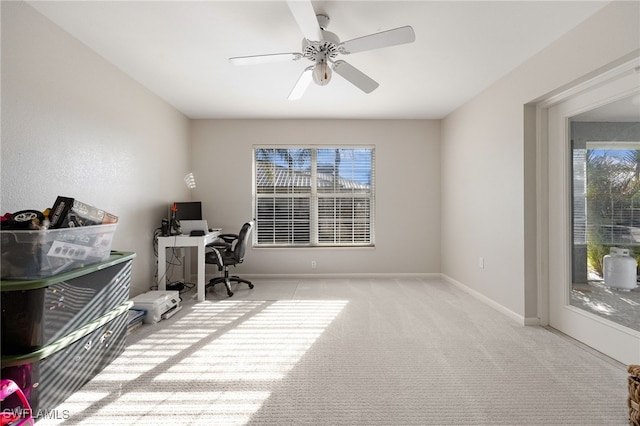 home office featuring ceiling fan, carpet flooring, and baseboards