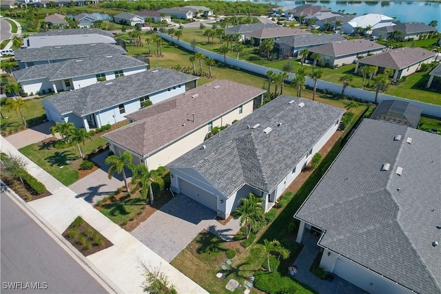 birds eye view of property with a residential view