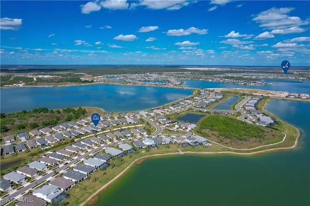 bird's eye view with a water view and a residential view