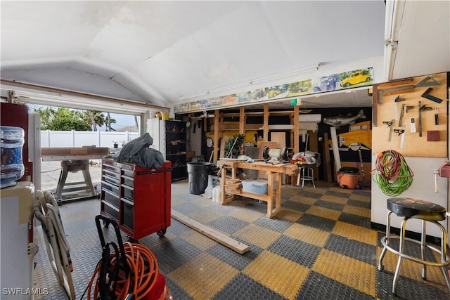 garage with a workshop area