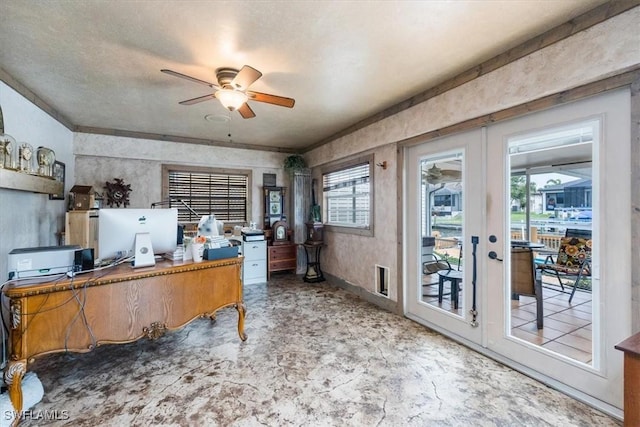 office space with french doors, a healthy amount of sunlight, and ceiling fan