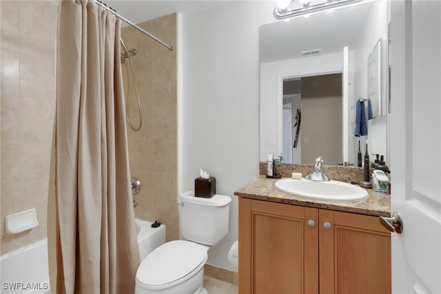 bathroom featuring toilet, shower / tub combo, vanity, and visible vents