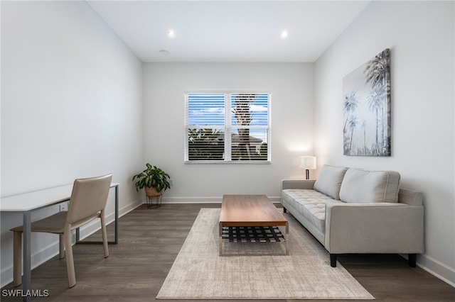 interior space featuring baseboards, dark wood-style flooring, and recessed lighting