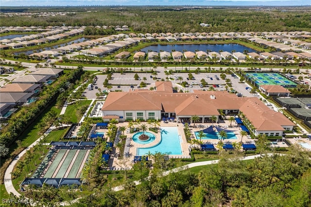 aerial view with a residential view and a water view