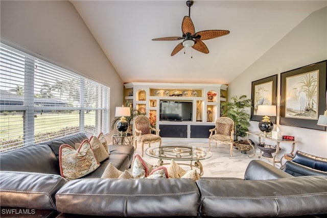 living area with lofted ceiling, ceiling fan, and built in shelves