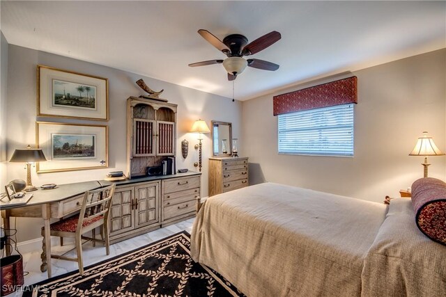 bedroom with light wood-style flooring