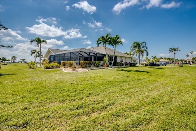 view of yard featuring a lanai