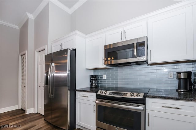 kitchen featuring stainless steel appliances, dark wood-style flooring, white cabinets, backsplash, and crown molding