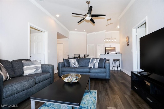 living area featuring ceiling fan, recessed lighting, baseboards, dark wood finished floors, and crown molding