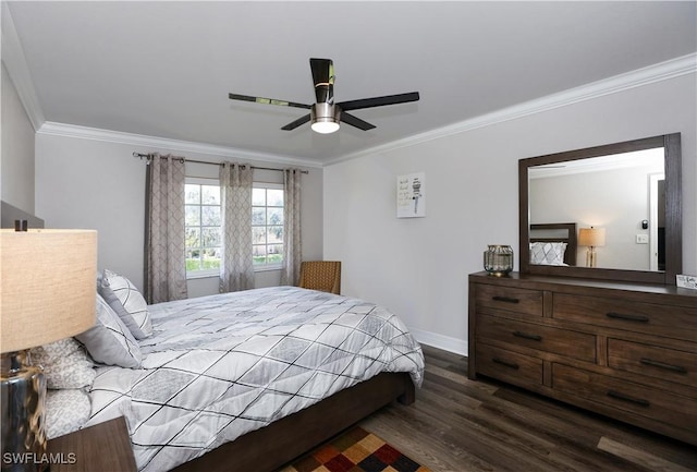 bedroom with a ceiling fan, baseboards, ornamental molding, and wood finished floors