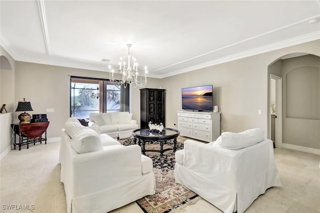 living room with arched walkways, baseboards, crown molding, and an inviting chandelier