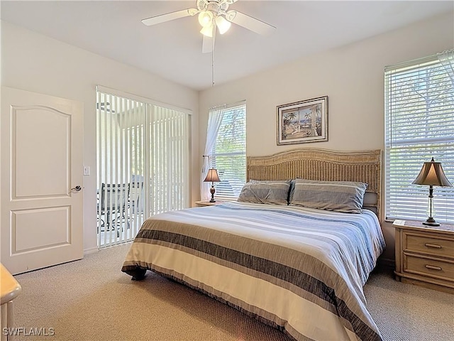 bedroom featuring carpet flooring, ceiling fan, and access to outside