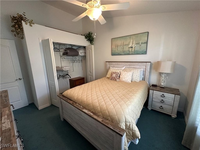 bedroom with dark colored carpet, a closet, lofted ceiling, a ceiling fan, and baseboards