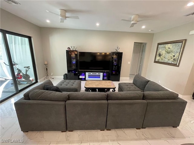 living room featuring marble finish floor, ceiling fan, and recessed lighting