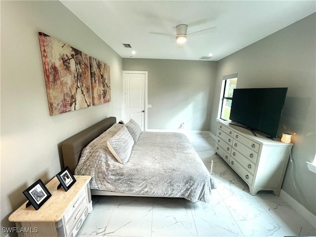 bedroom with marble finish floor, a ceiling fan, visible vents, and baseboards