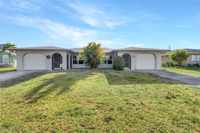 ranch-style home with concrete driveway, an attached garage, a front lawn, and stucco siding