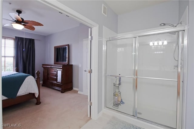 full bathroom with visible vents, ceiling fan, a shower stall, and ensuite bath