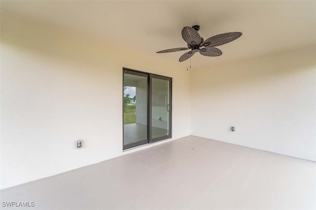 view of patio featuring a ceiling fan