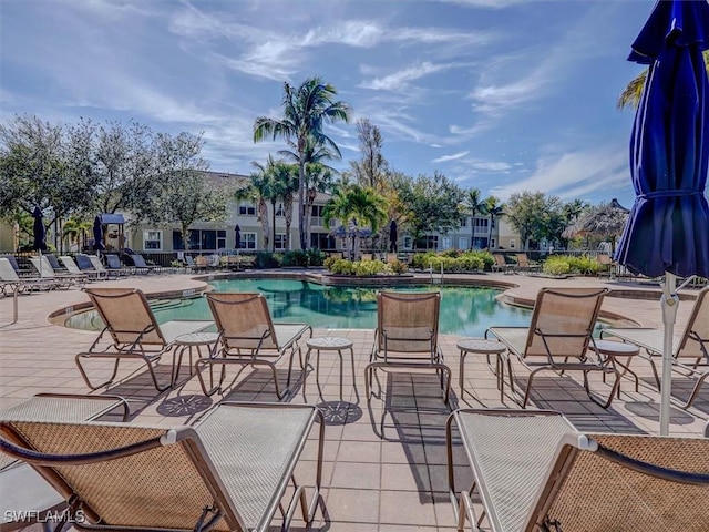 pool with a patio area