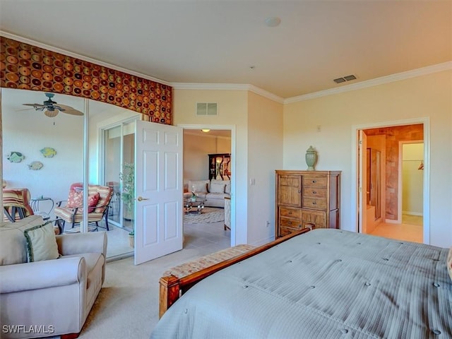 bedroom with ornamental molding, visible vents, and light carpet