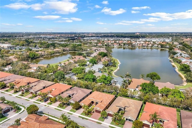 aerial view featuring a residential view and a water view