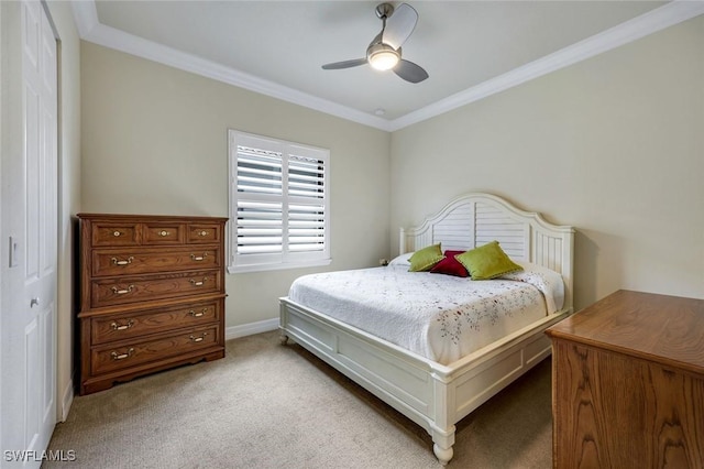 bedroom with ornamental molding, light carpet, baseboards, and a ceiling fan