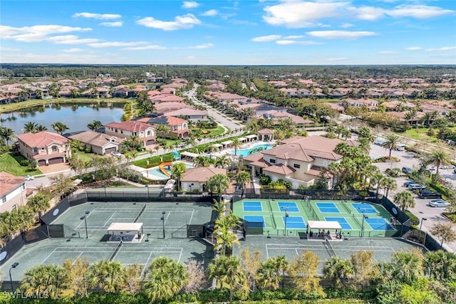 aerial view featuring a residential view and a water view